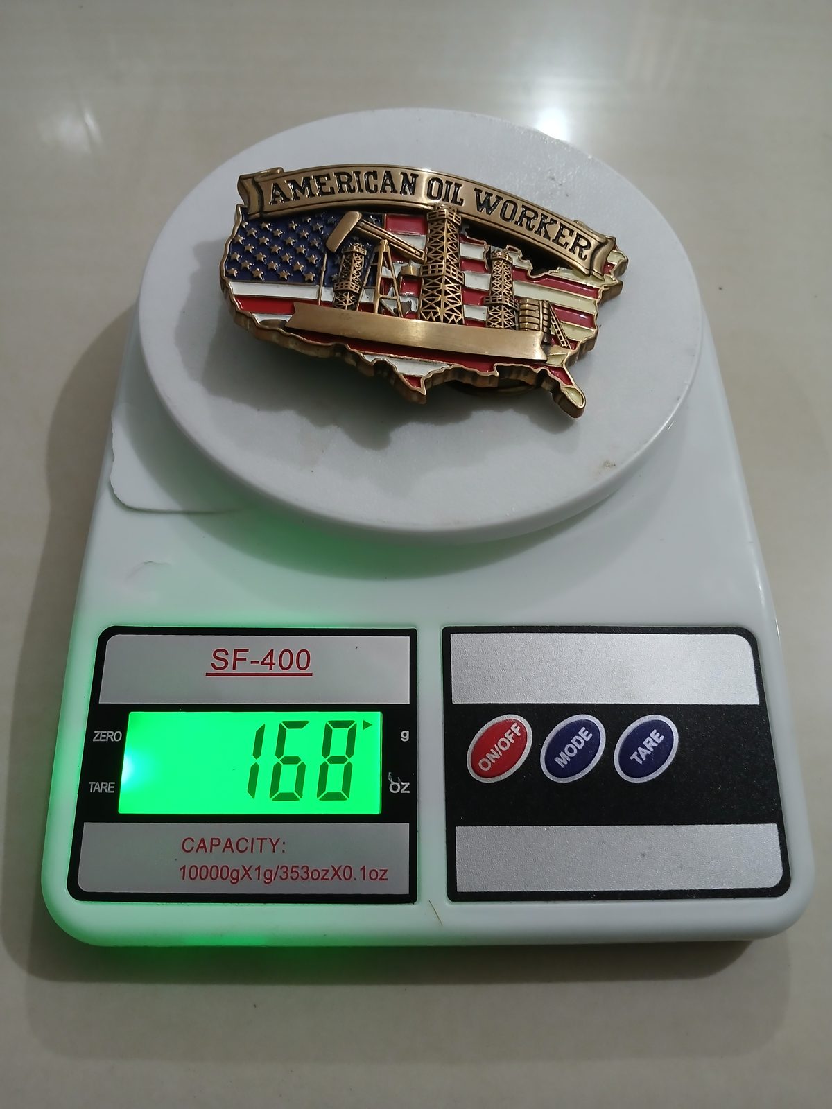 USA Flag Oil Rigs Vintage Belt Buckle – On scale showing weight USA Flag Oil Rigs vintage belt buckle – on scale showing weight