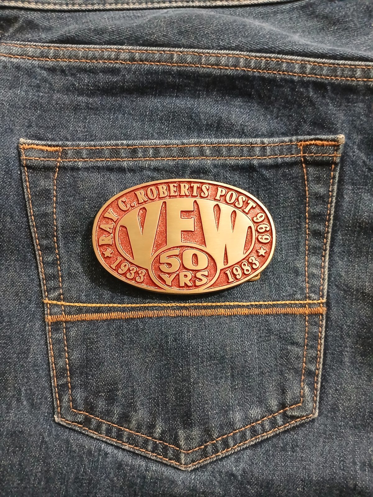 VFW 50 Years 1933-1983 Vintage Belt Buckle – On jeans back pocket VFW 50 Years 1933-1983 vintage belt buckle – on jeans back pocket