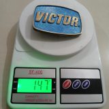 Victor vintage belt buckle – on scale showing weight