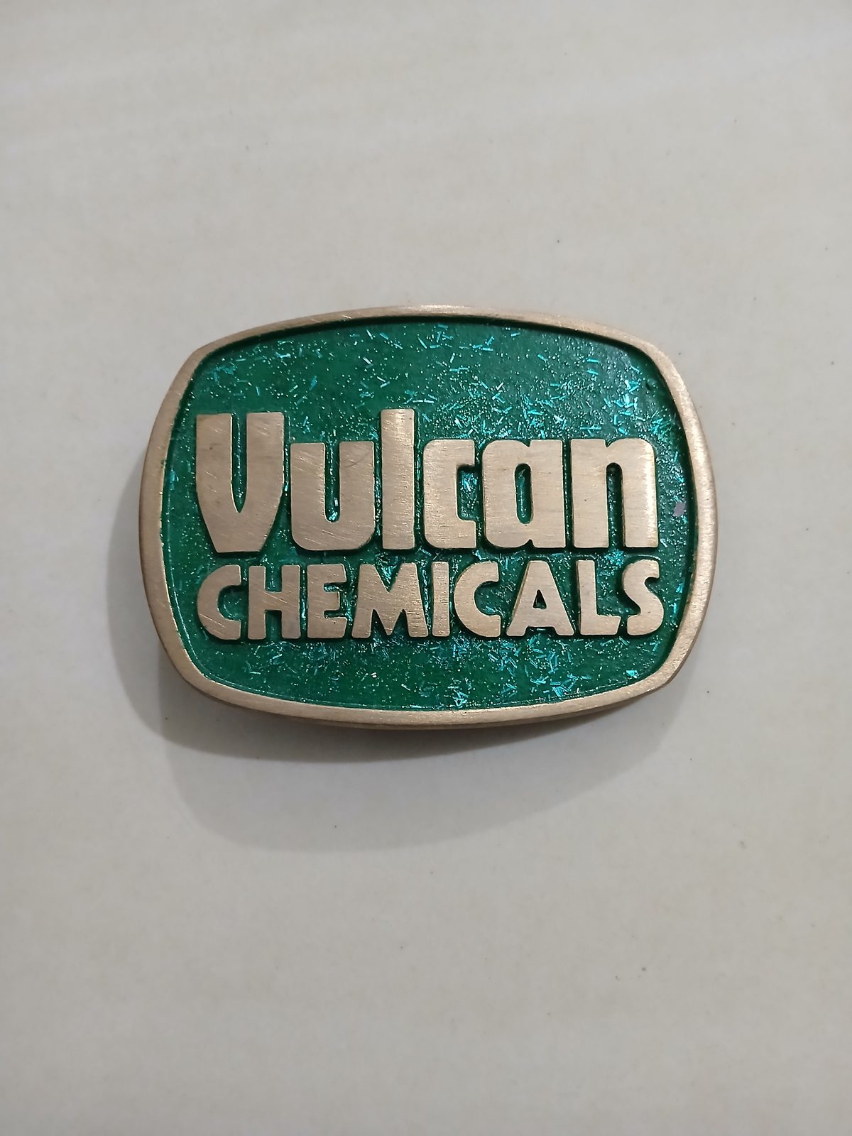 Vulcan Chemicals Vintage Belt Buckle – Front view Vulcan Chemicals vintage belt buckle – front view