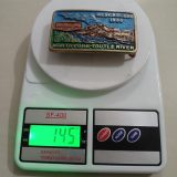 Washington Construction North Fork Toutle River vintage belt buckle – on scale showing weight