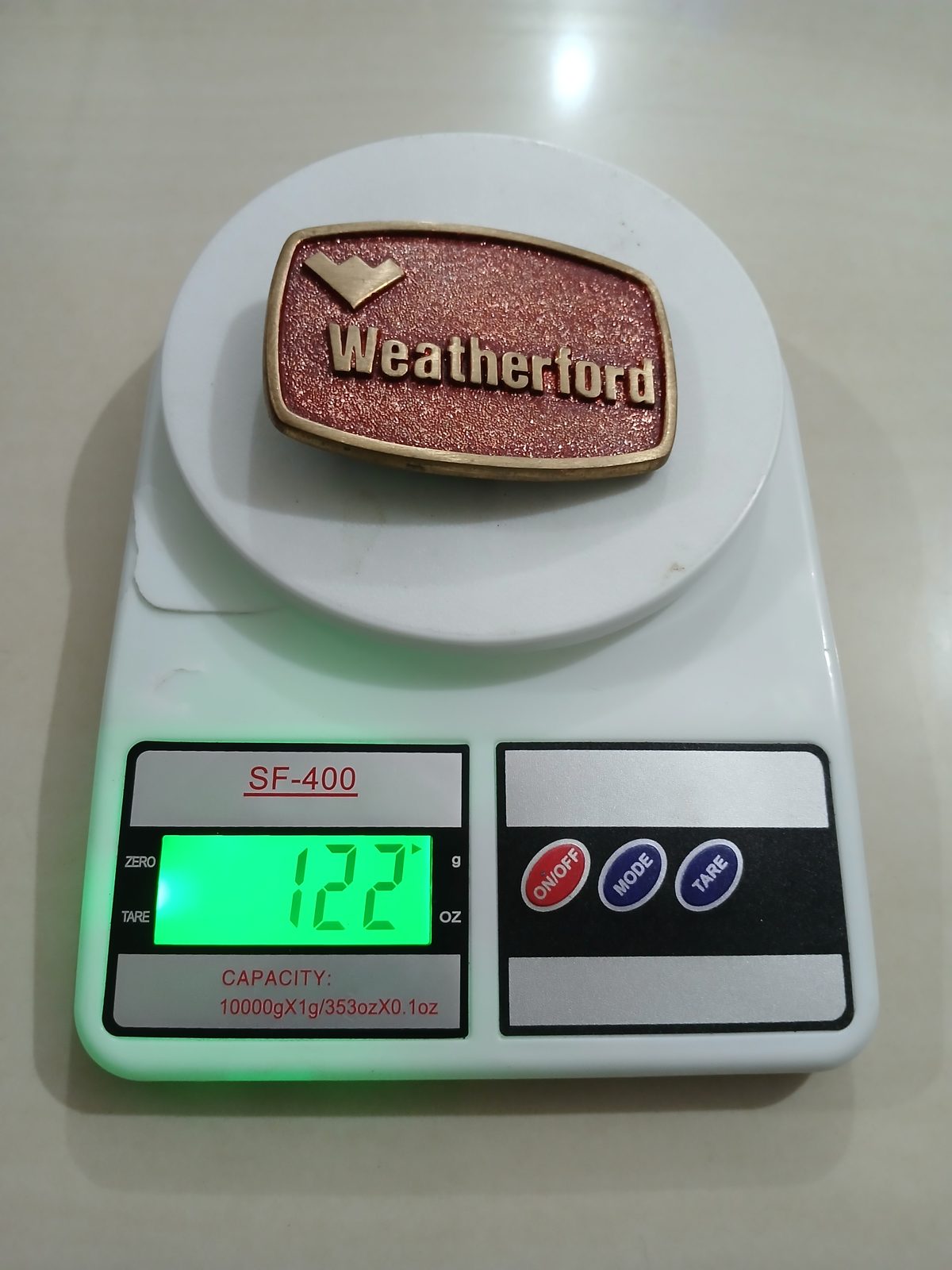 Weatherford Vintage Belt Buckle – On scale showing weight Weatherford vintage belt buckle – on scale showing weight