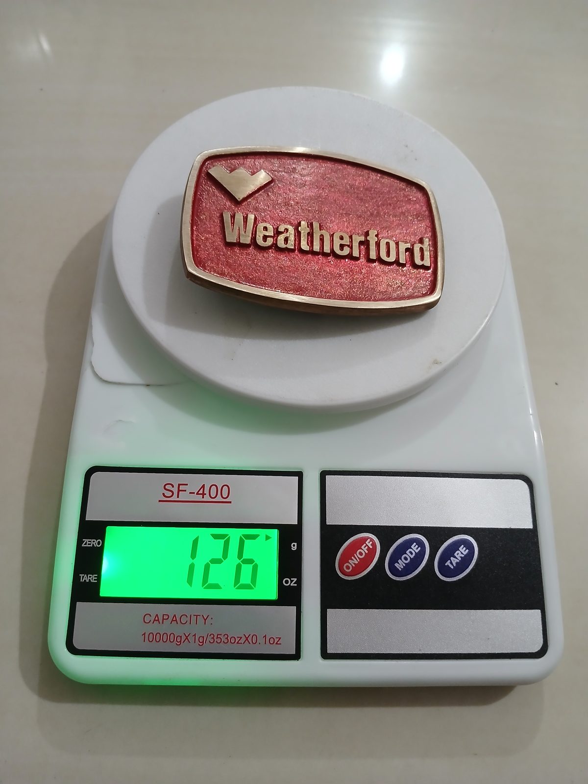 Weatherford Vintage Belt Buckle – On scale showing weight Weatherford vintage belt buckle – on scale showing weight
