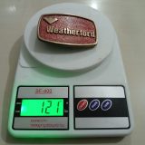 Weatherford vintage belt buckle – on scale showing weight