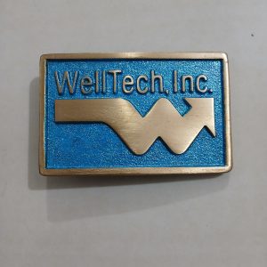 WellTech Inc vintage belt buckle – front view