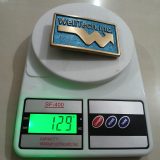 WellTech Inc vintage belt buckle – on scale showing weight