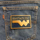 WellTech Inc vintage belt buckle – on jeans back pocket