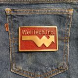 WellTech Inc vintage belt buckle – on jeans back pocket