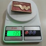 WellTech Inc vintage belt buckle – on scale showing weight