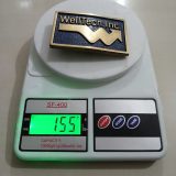 WellTech Inc vintage belt buckle – on scale showing weight