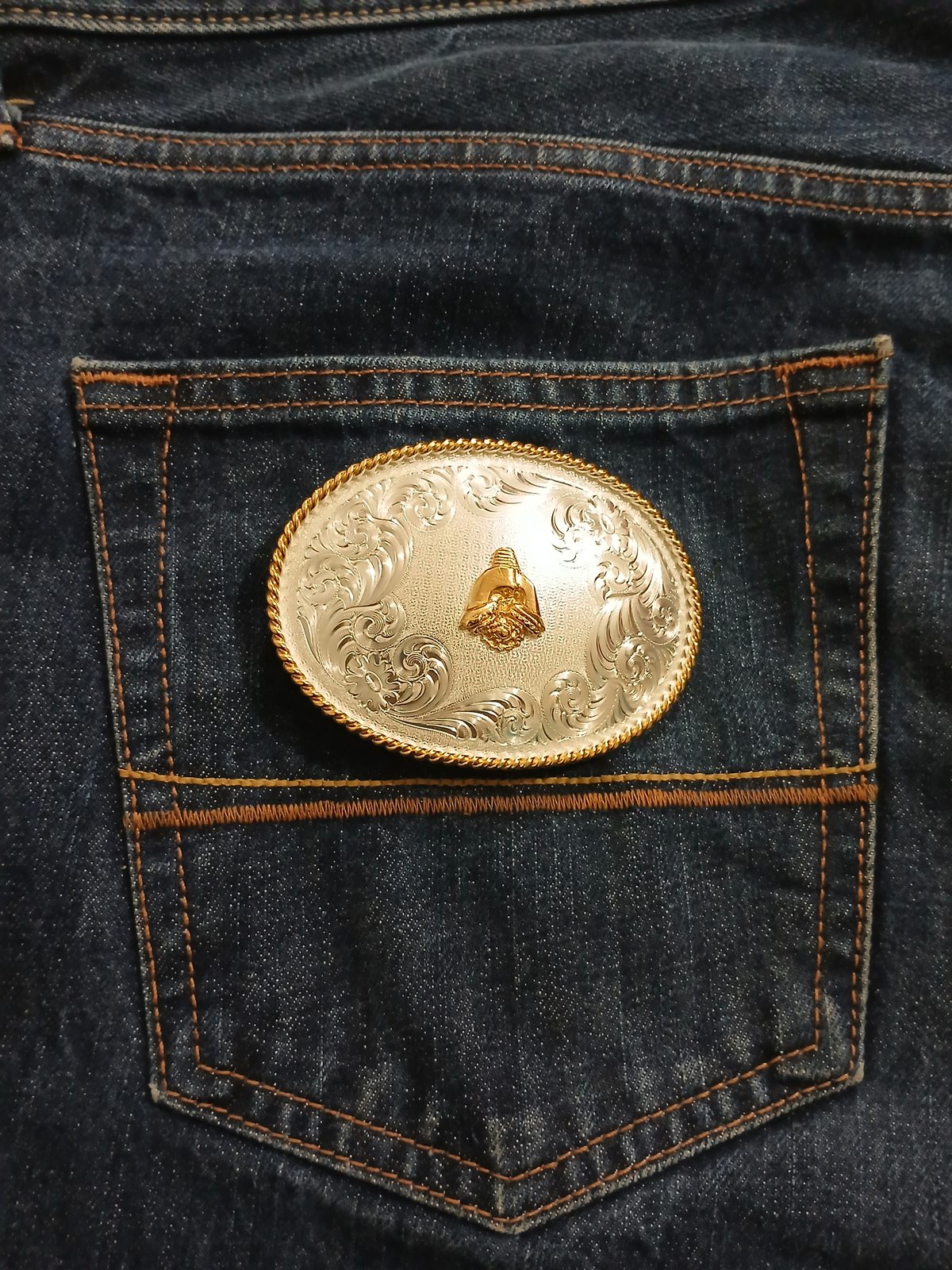 Western Silver Engraved Vintage Belt Buckle – On jeans back pocket Western Silver Engraved vintage belt buckle – on jeans back pocket