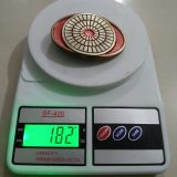 Wheel Pattern vintage belt buckle – on scale showing weight