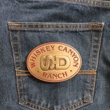 Whiskey Canyon Ranch vintage belt buckle – on jeans back pocket
