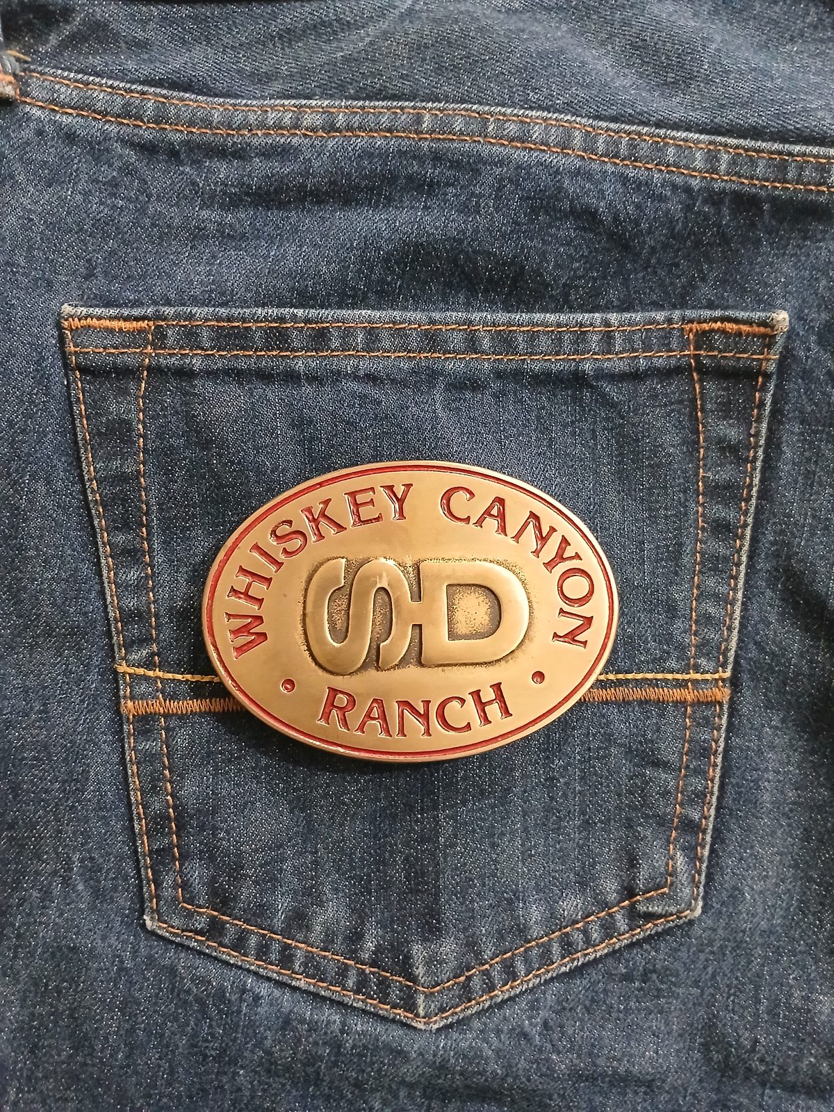Whiskey Canyon Ranch Vintage Belt Buckle – On jeans back pocket Whiskey Canyon Ranch vintage belt buckle – on jeans back pocket