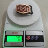 Winged Emblem vintage belt buckle – on scale showing weight