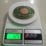 Woodchoppers Ball vintage belt buckle – on scale showing weight