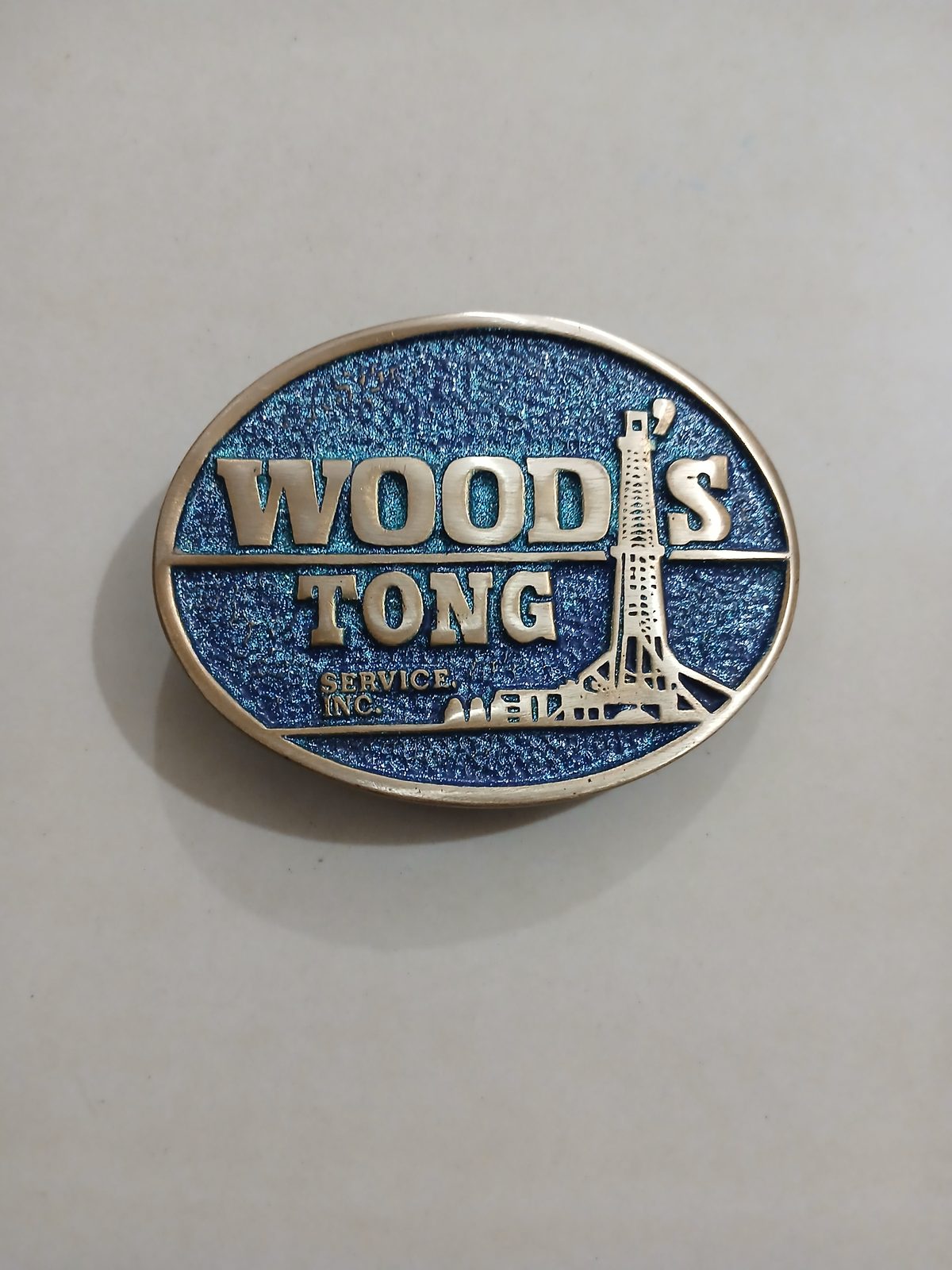Woods Tong Service Vintage Belt Buckle – Front view Woods Tong Service vintage belt buckle – front view